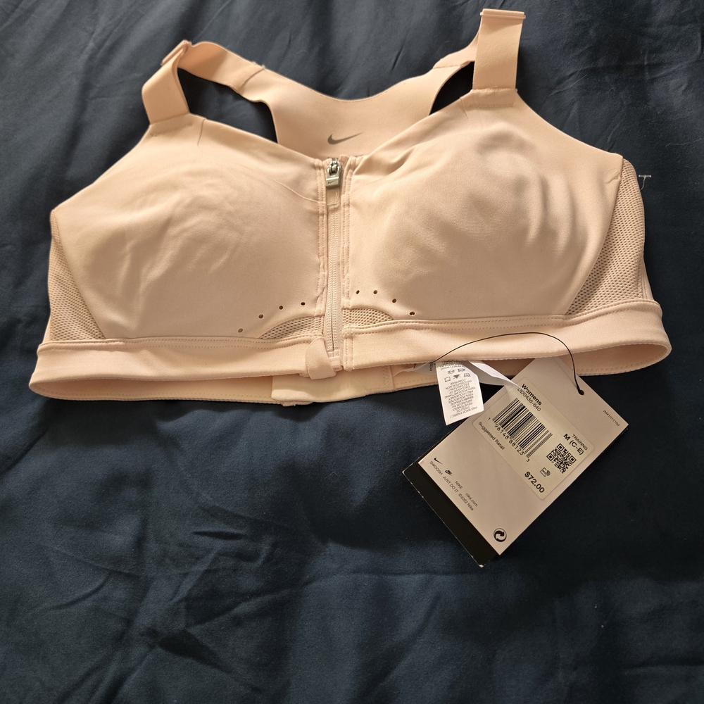 Nike Women's Light Pink Zip Sports Bra